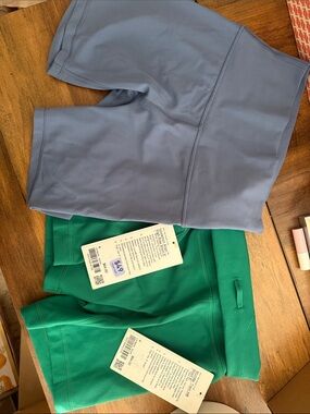 Women lulus  wunder train Green & align 6”Blue shorts both size 4